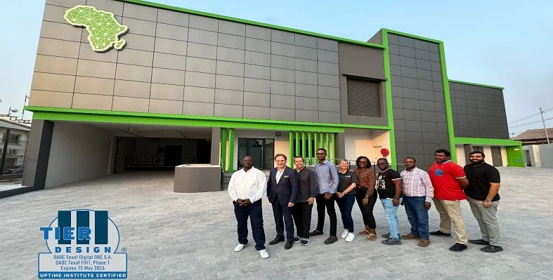 The team members standing in front of the new data centre in Kinshasa.