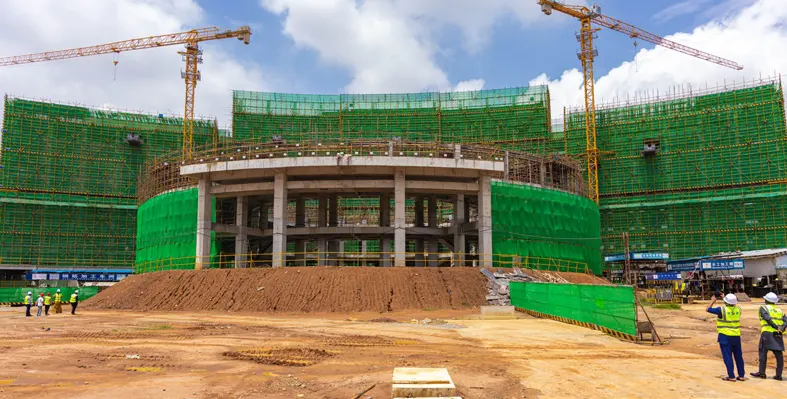 The HQ under construction, covered in scaffolding. 