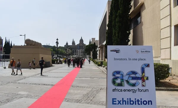 A picture of an aef stand with logo outside of the conference hall.