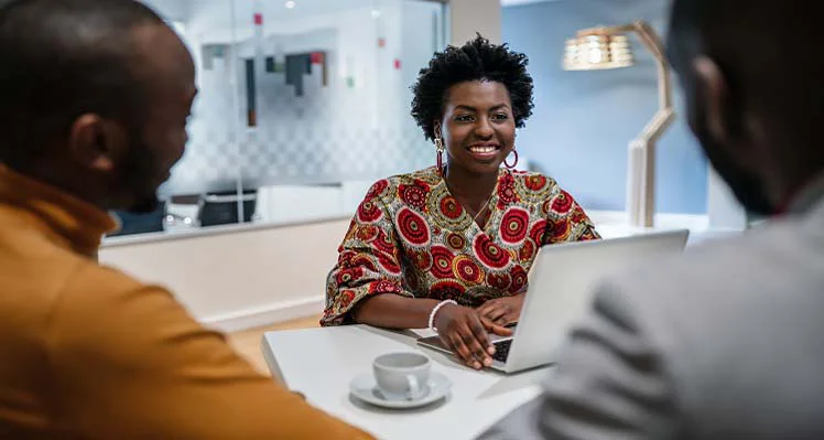 Over shoulder image of a business meeting.