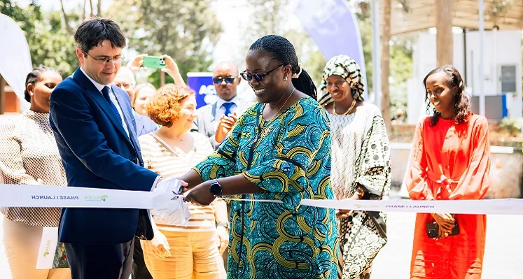 Jeanne d'Arc Mujawamariya opening the facility alongside David Hill. 